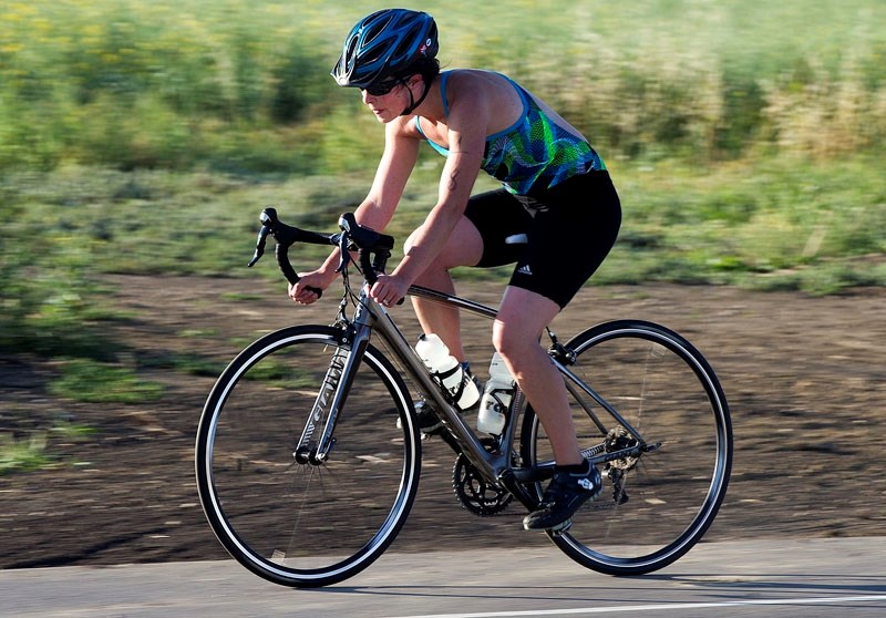 A participant tackles the bike portion of last year&#8217;s St. Albert Triathlon.