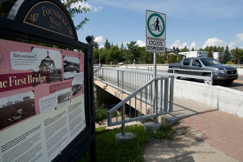 STILL HERE â€” The Perron Street Bridge as it appears today. While there are wooden posts beneath it