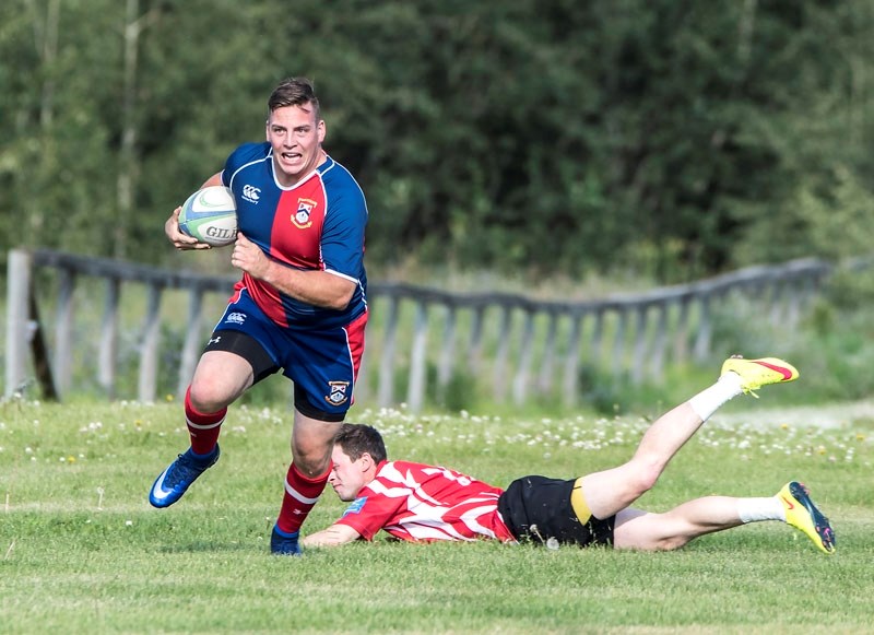REVVED UP &#8211; Matt Mackenzie of the St. Albert Rugby Football Club turns on the jets against the Strathcona Druids on Friday night in Sherwood Park. Mackenzie saw action