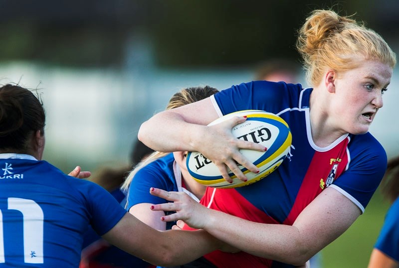 UNSTOPPABLE â€“ Sydney De La Mare of St. Albert powers her way past the Pirates in Wednesday&#8217;s division one women&#8217;s match in the Edmonton Rugby Union. De La Mare