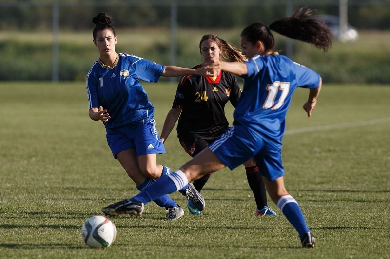 STRETCH PLAY â€“ Laura Marrazzo (17) tries to get a foot on the ball in front of Caitlyn Seguin (7) for the St. Albert Impact in Wednesday&#8217;s 2-1 division 1B win over