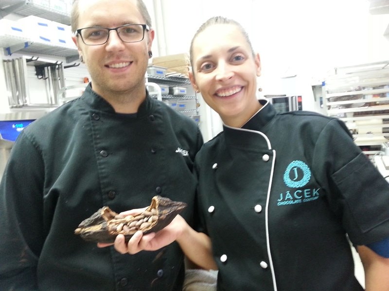 Chocolate makers Jacqueline Jacek and Curtis Jones hold the raw pod of cacao beans