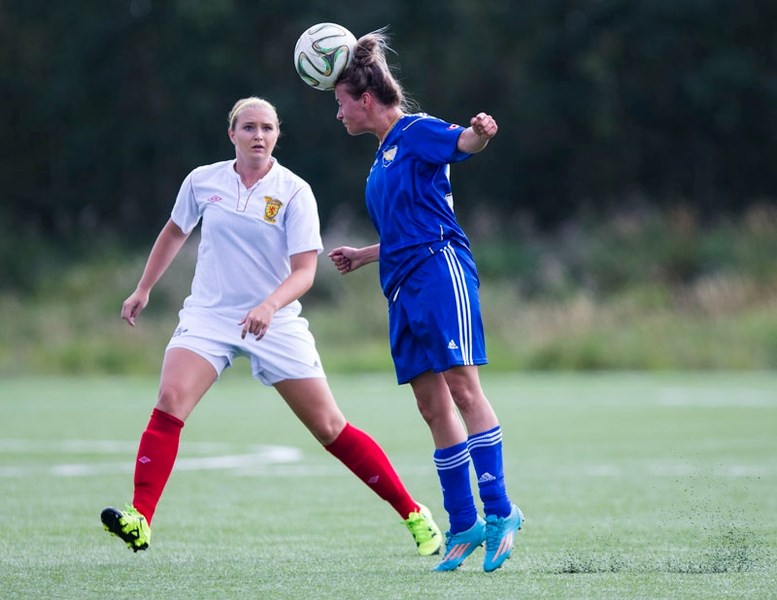 KNOCKER BALL â€“ Hallee Peter of the St. Albert Impact heads the ball in front of the Angels Scottish SC player in Saturday&#8217;s Tier I provincial qualifier in the