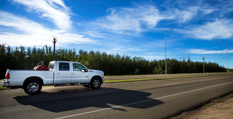 Traffic moves along Campbell Road near the area where a long-planned St. Albert park and ride will be built. Provincial and federal funding for preliminary design of a Metro