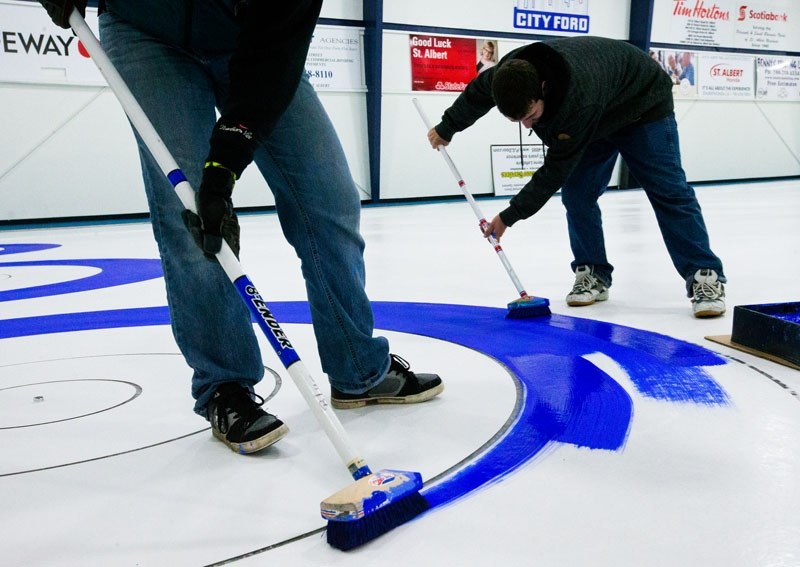 RINGING IN THE SEASON â€“ St. Albert Curling Club staff member Tyler Codner