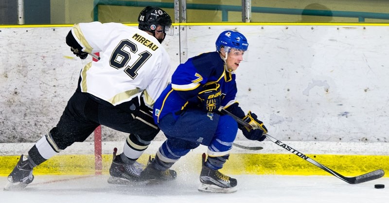 FORWARD DRIVEN â€“ Jake Mercier of the St. Albert Merchants skates away from Jesse Mireau of the Strathcona Bruins in Friday&#8217;s junior B exhibition at Akinsdale Arena.