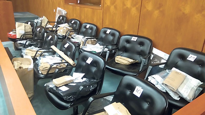 The large volume of evidence was piled in the jurors&#8217; box during the three-month trial.