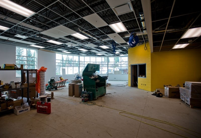 READING LIGHTS â€“ The school features a prominent library at the front of the building. It has many windows to make use of natural light.
