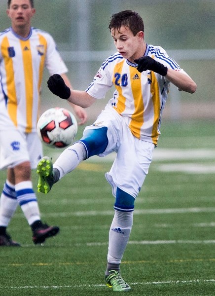KICKER â€“ Laine Santos strikes the ball for the St. Albert Impact