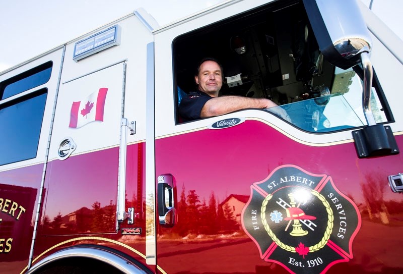 St. Albert Fire Services Deputy Chief Bernd Gretzinger sits in the cab of the newly acquired areial truck now located at Fire Station No. 3 on Giroux Rd. The truck was custom 