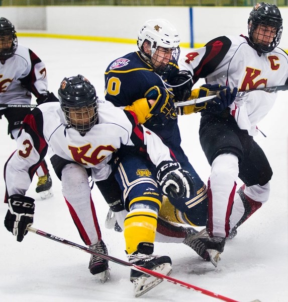 DERAILMENT â€“ Cam Aucion of the St. Albert Flyers is caught in the middle of a collision during Saturday&#8217;s 5-0 victory over the KC Centennials at Akinsdale Arena. The