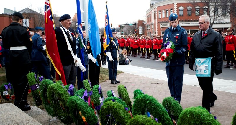 LAYING WREATHS &#8211; A member of the Royal Canadian Air Cadets lays a wreath at the war memorial during the Remembrance Day ceremonies in St. Albert in 2015.