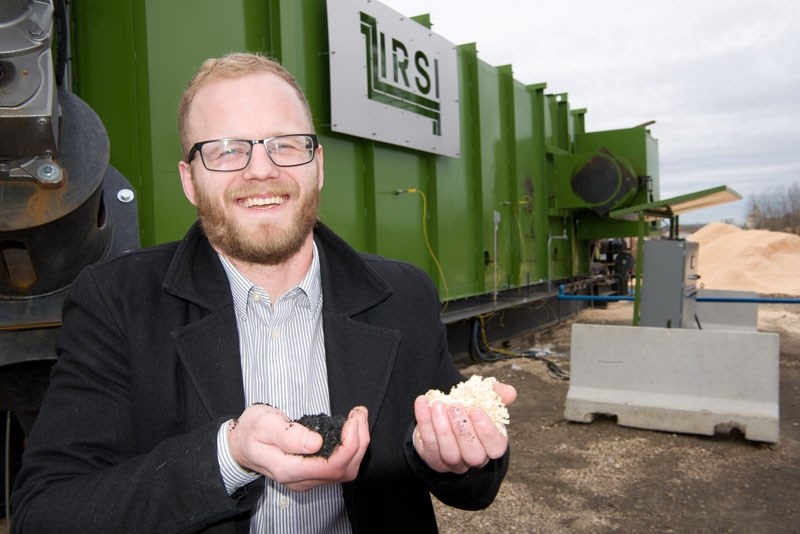 IT WORKS! â€“ Former St. Albert resident Chris Olson shows off some of the biochar his company&#8217;s pyrolysis machine produced from wood waste earlier this month. Olson is 