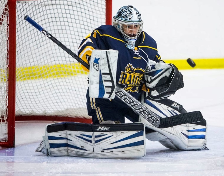 NET DEFENDER â€“ Brianna Sank of the midget AAA St. Albert Slash faces a shot in regulation time against the Red Deer Chiefs in the Alberta Female Hockey League on Sunday.