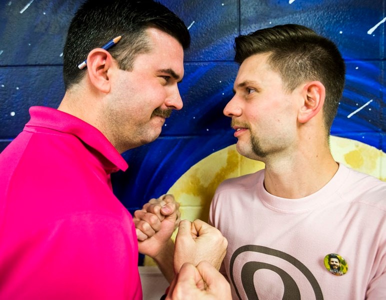 Evan Holstein and Troy Bontus are head to head in a moustache battle royale. They are raising money to support men&#8217;s health through Movember.