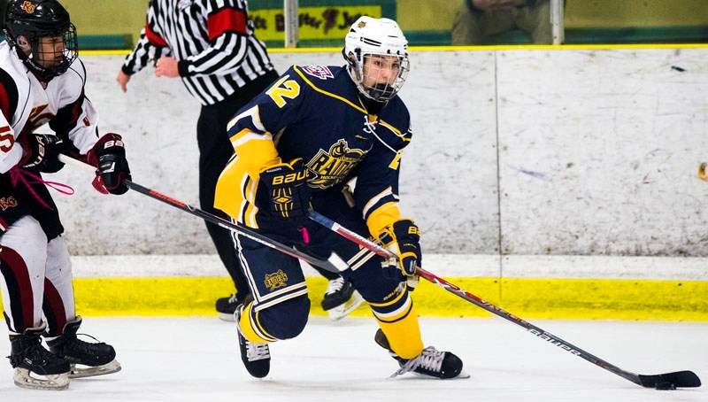 FLYING ON THE ICE â€“ Dominik Cesarz of the St. Albert Flyers skates with the puck in the Alberta Minor Midget AAA Hockey League. The midget 15 Flyers are 12-0 as the top