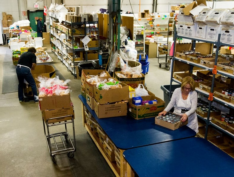 A shot of the St. Albert Food Bank workers preparing for the annual food drive earlier this year.