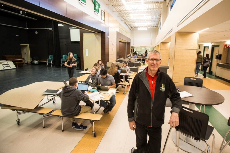 Principal Mike Tod shows off the newly completed courtyard in the recently renovated William D. Cuts Junior High School. The school is inviting members of the community to