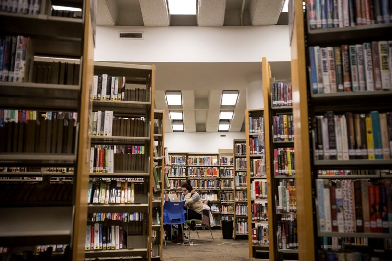 A patron uses the St. Albert Public Library. Council recently approved a capital budget that includes funding to construct a new library.