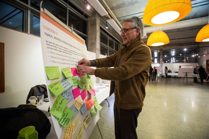 MANY IDEAS â€“ Bill Ross adds his voice to a board seeking opinions from area residents on the future of Lois Hole Provincial Park. Alberta Parks held an open house looking