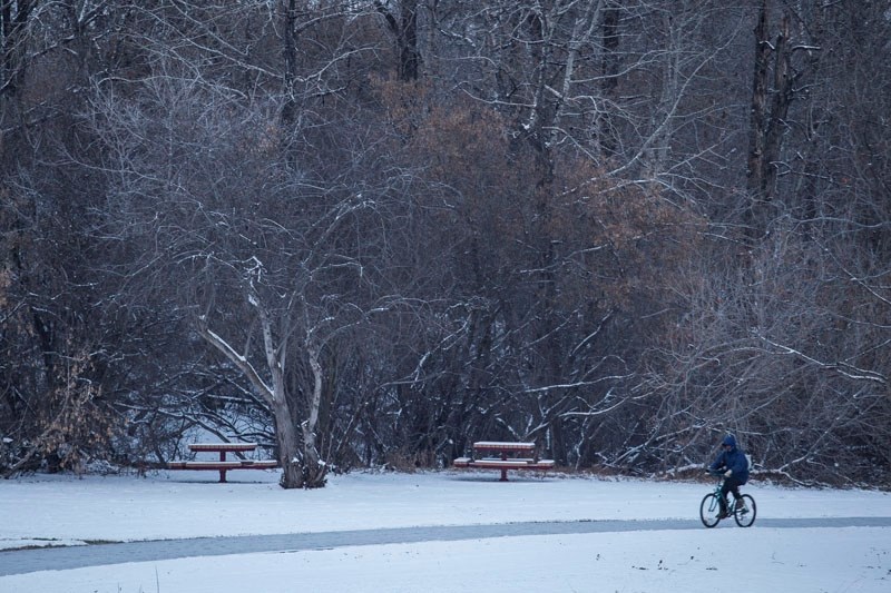 A lone cyclist braves the cold on a St. Albert pathway on Thursday. Temperatures hit a low of -28 on Friday