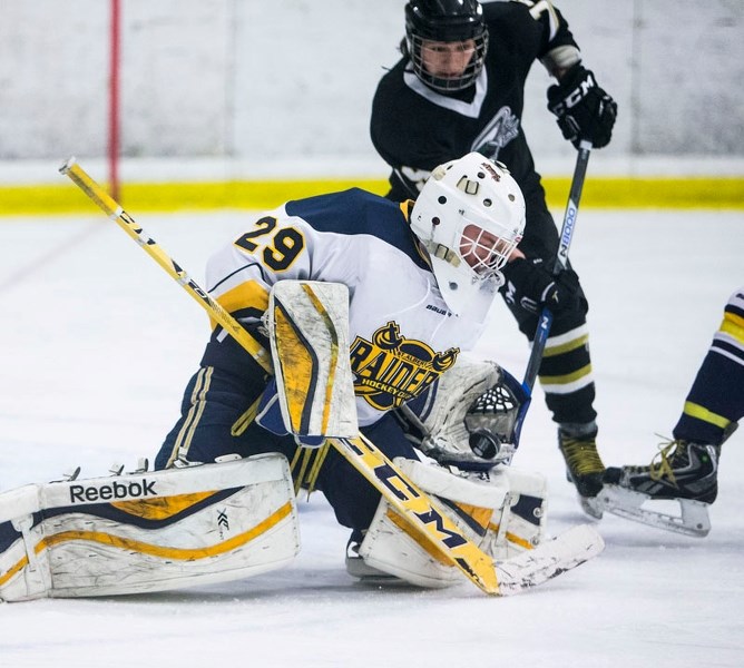 GLOVE WORK â€“ Josh Ironside of the St. Albert Royals makes a glove save in Wednesday&#8217;s 5-0 victory over the PAC Saints of Spruce Grove at Akinsdale Arena. Ironside