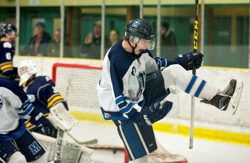JETS SCORE WIN â€“ Dallas Routh of the Morinville Jets celebrates a second-period goal by Lee Gadoury against the St. Albert Merchants to make it 1-1 in Friday&#8217;s junior 