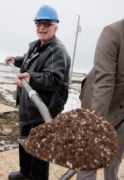 DIG IN! â€“ Retired St. Albert Public School trustee Joe Demko breaks ground on the new Joseph M. Demko School in northern St. Albert Wednesday. The 900-student school is set 