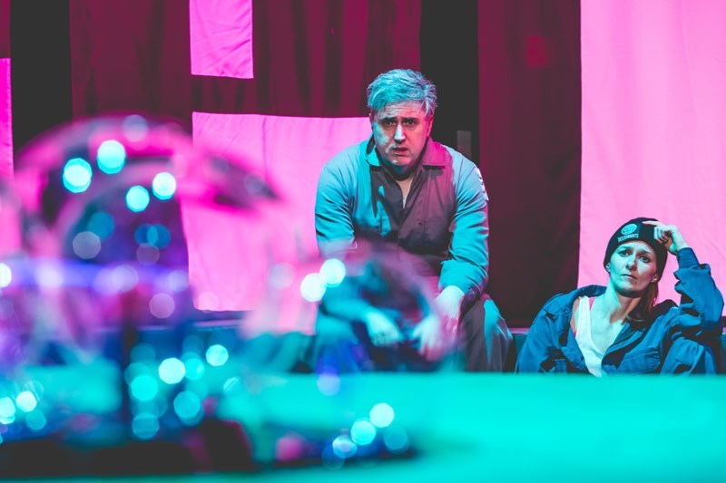 Simon (Garett Ross) and Tara (Kristi Hansen) stare at the doomsday machine that has accidentally been activatated in Star Killing Machine now playing at Backstage Theatre