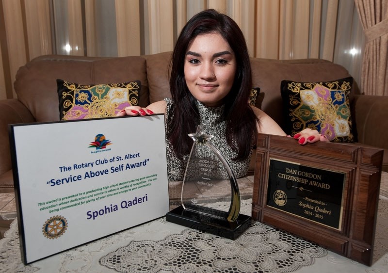 COMMUNITY ACTIVIST – Sophia Qaderi with a few of her many awards and recognitions at her home in St. Albert. The decorated community volunteer was picked for the Top 30 Under 