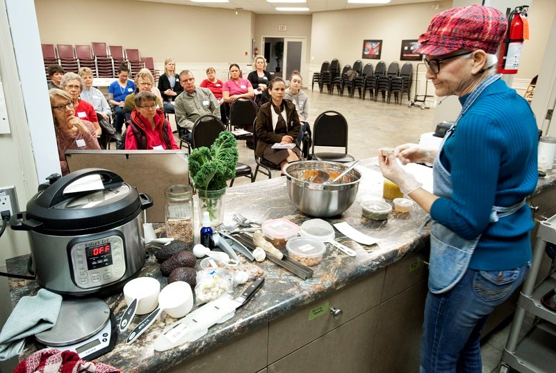 Yvonne Smith prepares a Wild Rice Salad during her Journey to Healthy Eating class at the Red Willow Community Church.