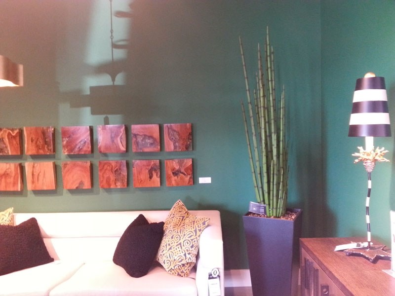Greenery is a nod to the importance of colour in home decor to set the mood. This can include vibrant navy and green shades on walls and table lamps as well as other bold