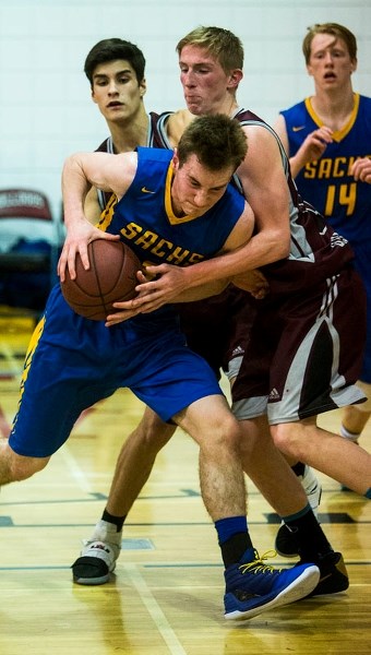 DETERMINATION – Joseph Marsiglio of the St. Albert Skyhawks battles his way past Hudson Olson