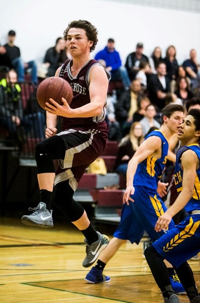 SHOWTIME – Tye Weiss of the Bellerose Bulldogs weaves his magic for 13 points in Wednesday&#8217;s 78-56 victory over the St. Albert Skyhawks at Bellerose Composite High