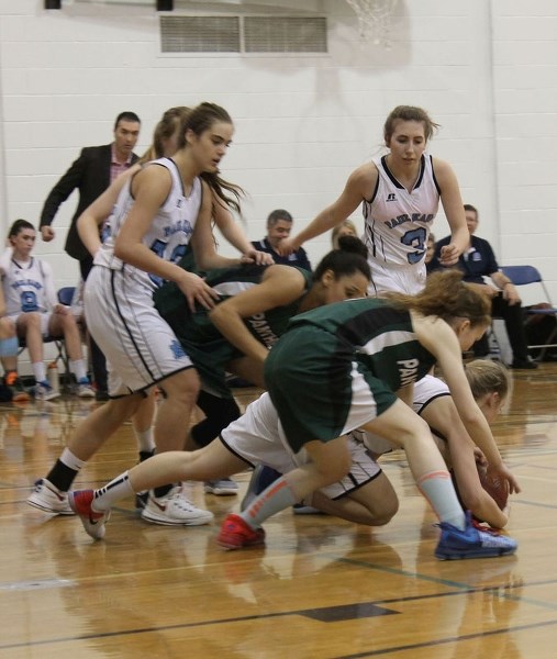 PILEUP – The Paul Kane Blues and Spruce Grove Panthers battle for a loose ball in Wednesday&#8217;s metro Edmonton division one match at Paul Kane. Georgia Sherstan&#8217;s
