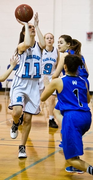 SURE SHOT â€“ Anna Lueck of the Paul Kane Blues shoots for the hoop in last week&#8217;s metro Edmonton junior game against the Harry Ainlay Titans at Paul Kane. The Blues