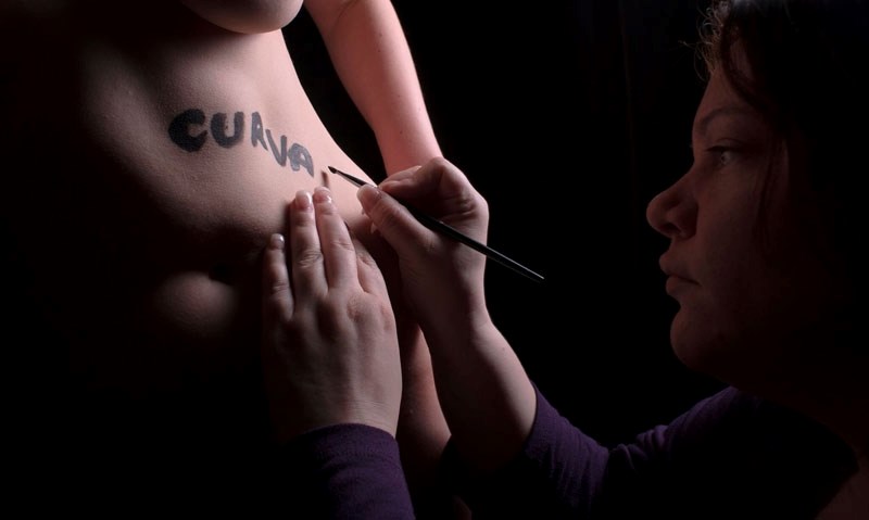 Star Newman took a series of photos of nude women writing positive and negative words of self-image on each other. Newman considers her exhibit