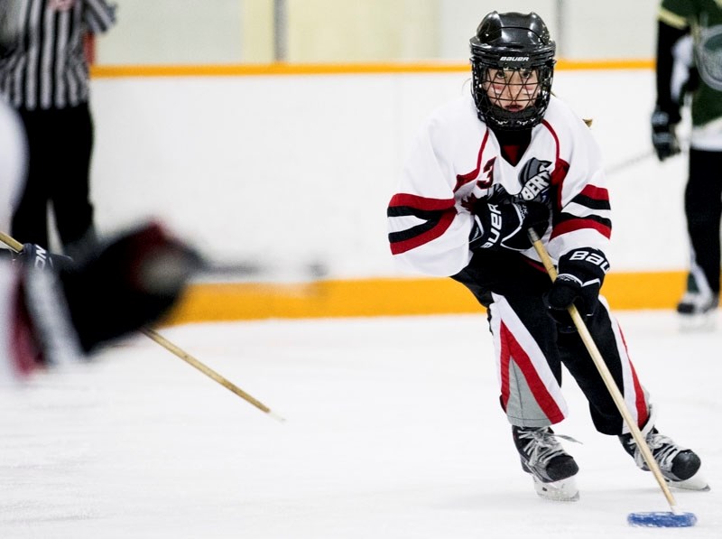 RINGING IT UP – Janie Lajoie controls the ring for the St. Albert Mission U14AA tweens