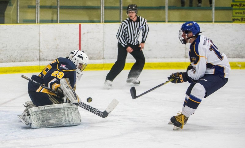 LAST LINE OF DEFENCE â€“ Chris Curr of the St. Albert Tire Warehouse Raiders stops the puck in Tuesday&#8217;s 4-3 overtime win against the Leduc Oil Kings in the