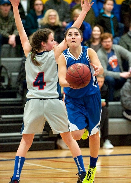 SIDESTEP – Teagan Gomes of the Richard S. Fowler Falcons slips past Holly Borrett of the Vincent J. Maloney Marauders during the St. Albert Physical Education Council Tier 1