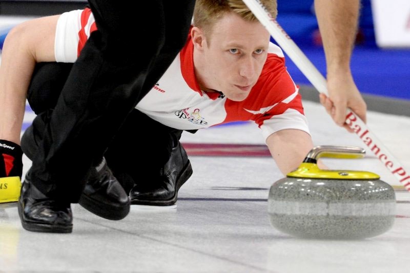 ROCKING THE BRIER – Marc Kennedy of St. Albert delivers a rock at the Tim Hortons Brier in St. John&#8217;s Nfld. The third for the Team Canada rink skipped by Kevin Koe was