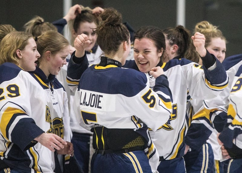 CHAMPIONSHIP DELIGHTS &#8211; The St. Albert Slash celebrate Sunday&#8217;s 2-0 victory over the Rocky Mountain Raiders in the Alberta Female Hockey League midget AAA