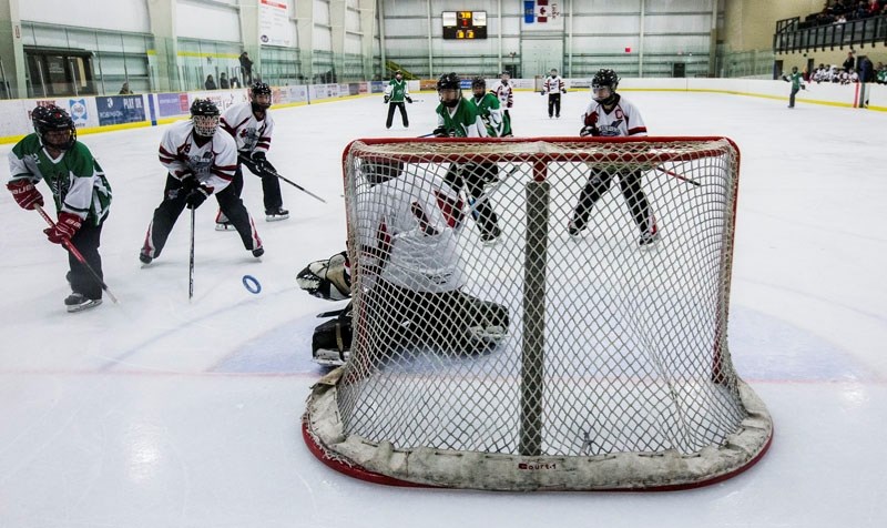 DEFENDING â€“ Shaylene Laufersweiler guards the net for the U19AA St. Albert Mission