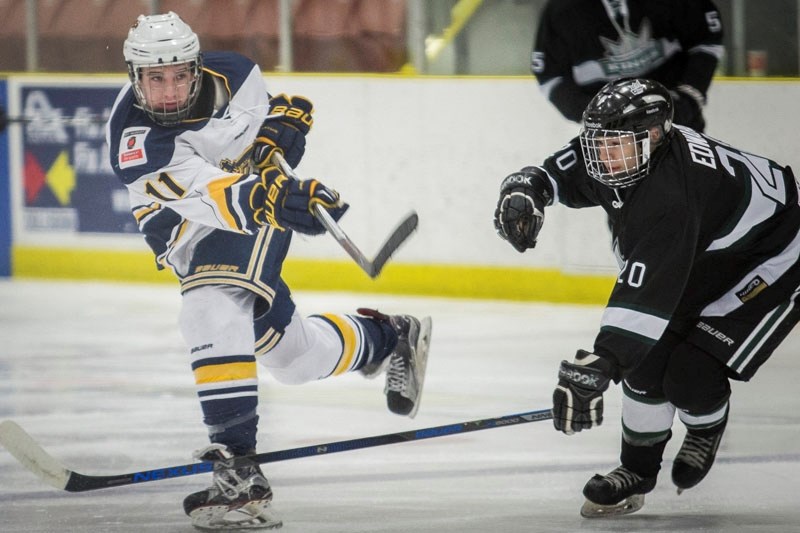 SHOOT TO SCORE &#8211; Brett Miller follows through on a shot for the St. Albert Source for Sports Crusaders in the Northern Alberta Midget AA Hockey League. The provincial