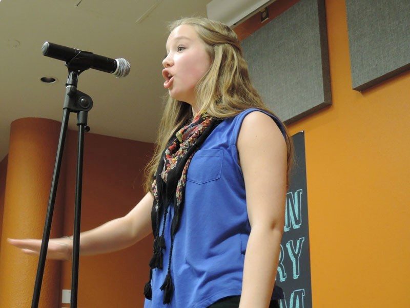 Julia Sorensen in a particularly expressive moment during the second Teen Poetry Slam at the St. Albert Public Library.