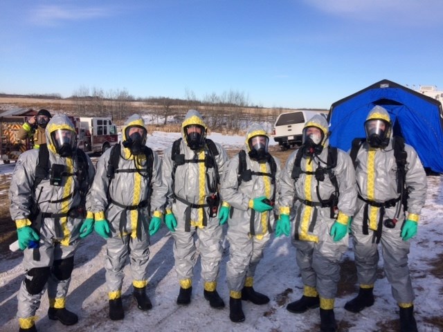 The members of the CLEAR team responding to a call wearing their Level B protection. The suits are totally protective as well but not totally encapsulating. They have an