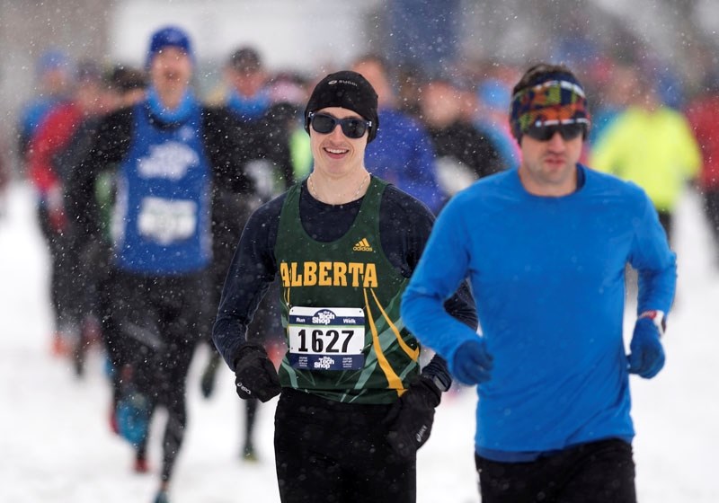 LEADERS OF THE PACK – Kieran McDonald (1627) and Alex Petrosky pull away from the rest of the field during the 10-mile mass start at the Landrex St. Albert Road Race on a