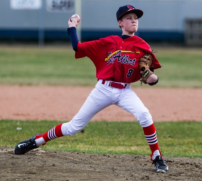 THROWING HEAT &#8211; Marc Brisson delivers a pitch for the St. Albert Cardinals in Wednesday&#8217;s 6-1 loss to the South Jasper Place Jays at Legion Memorial Park. The