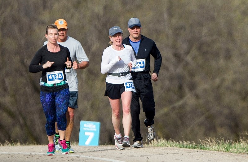 RUNNING WILD – Premier Rachel Notley runs with her security personnel along Sturgeon Road while participating in the Leading Edge Physiotherapy RunWild half-marathon Sunday