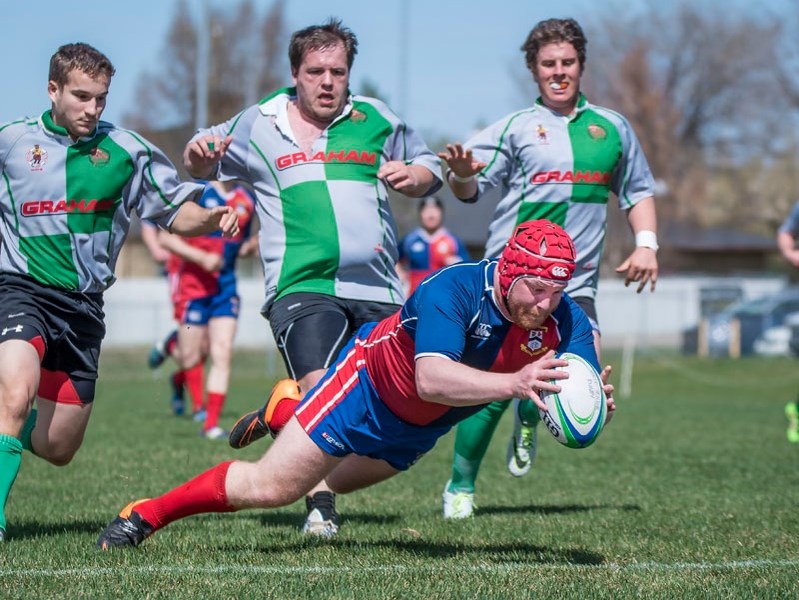 CROSSING THE LINE â€“ Paul Flynn dives over the try line to complete a highlight-reel chip-and-chase in the second quarter of Saturday&#8217;s third division match against